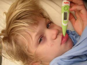 How can I reduce my child's fever without using medicine