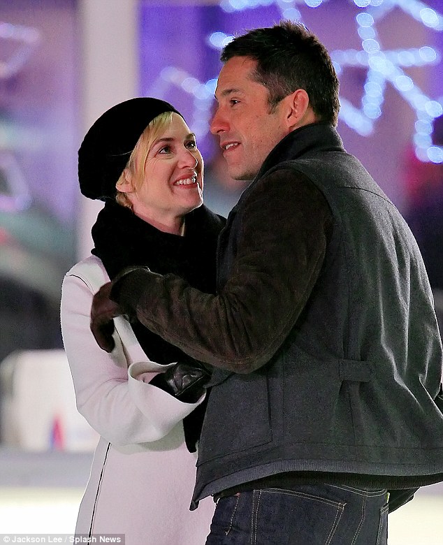 Kate Winslet kisses Enrique Murciano while Filming on a Skating Rink